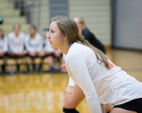 Hannah Fergus focuses on a serve, getting ready to spike and win the second game for CK. 