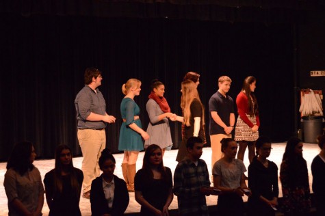 Each inductee walked across the stage to shake hands with all of the current officers.