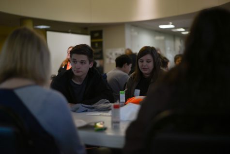 Juniors Kallista Denton and Kellen Leavell participate in a project and contribute ideas to the group.