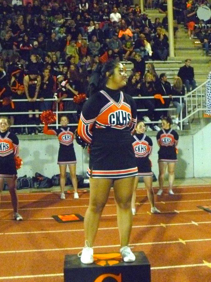 All Smiles > Junior Sophia Miana has been cheering for the CK for three years now.