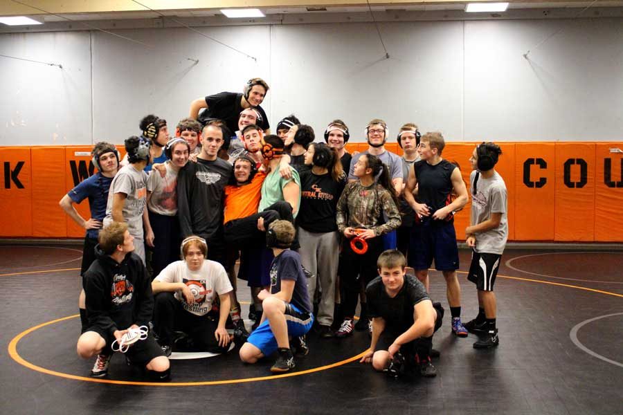 The wrestling team gets together for one last practice before their Hammer Head Tournament 