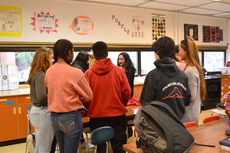 President Rozelle Rubio discusses designs for the class t-shirts.