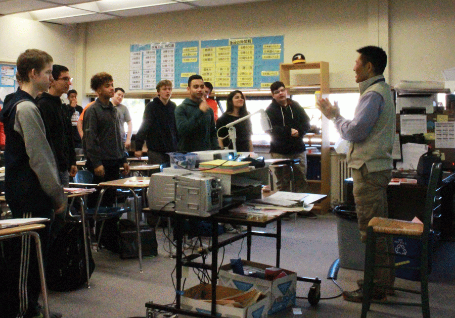 Moto Oishi, the Japanese teacher, and his class.