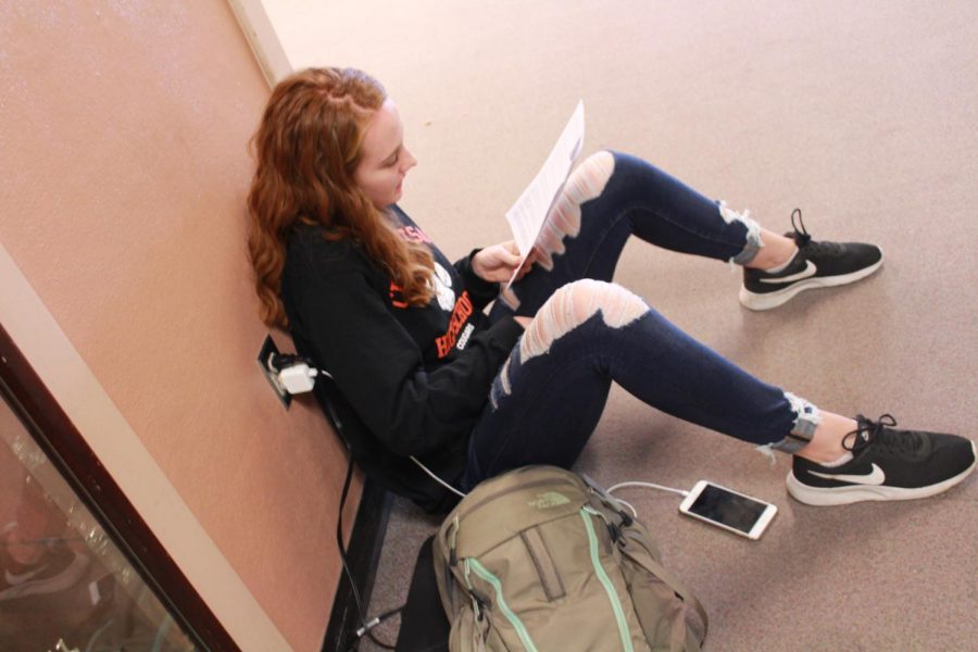 Madison Wallis studying in the halls on Central Kitsap High School