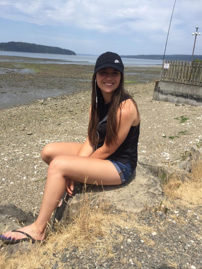Clara chillin on the beach.