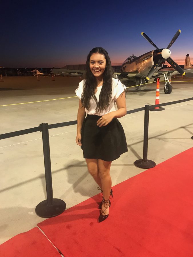 Kiah Warren walking on the red carpet of aviation in Dallas, Texas at the aviation event ceremony she went to. 