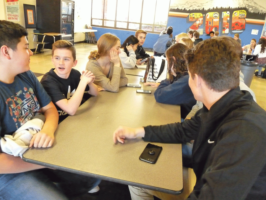 Freshman friends enjoy lunch together in the cafeteria 