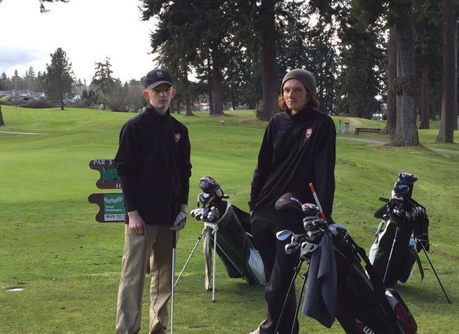 Senior Collin Smith and Junior Collin Beil at a match against Port Angeles.