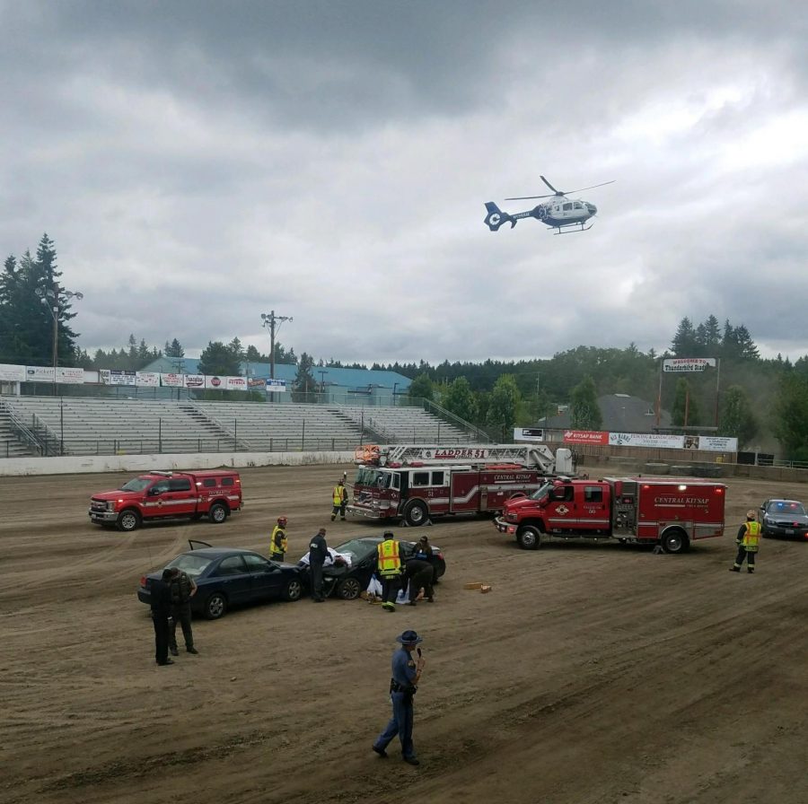 The scene of the crash as the helicopter lands for an air lift evacuation. 