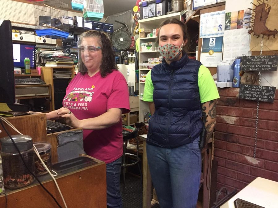 Both Shannon Randall and Sadie Flaherti work at the cash register, along with assisting costumers.  