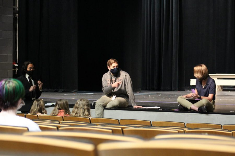 Zack Timm giving notes to Drama Club students