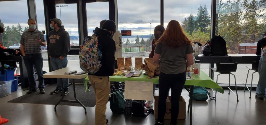 Students participate in the Environmental Club's Winter Toast Off Christmas contest for a chance to win cookies.  