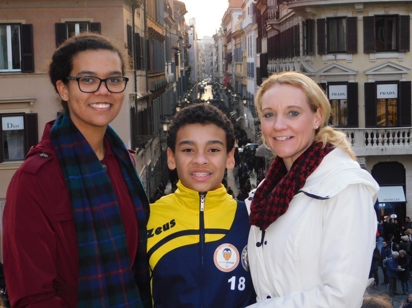 Aiden Brown with his mother and older sister in Italy.