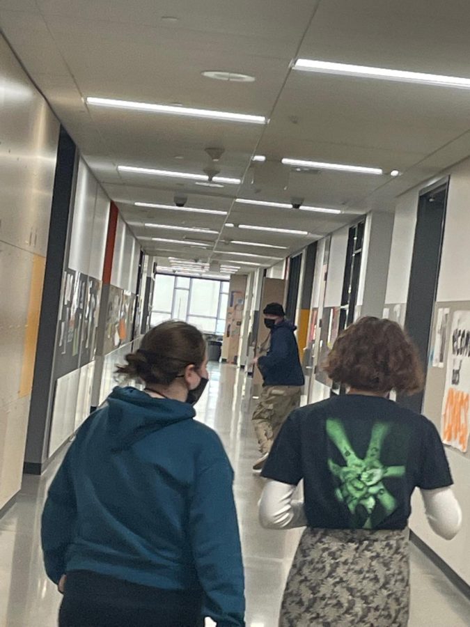 White running from class while also dodging journalists requests to comment. Photo provided by Olivia Miller.