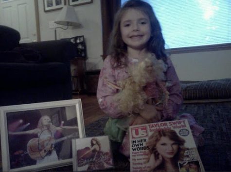 Laney Lark in 2011 surrounded by Taylor Swift merchandise. 