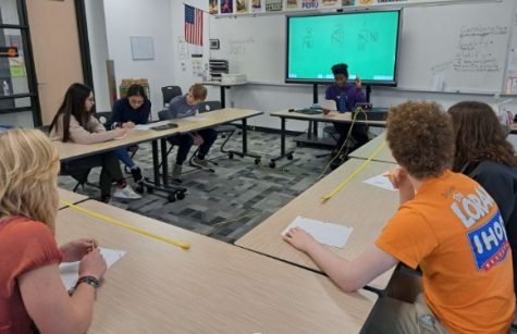 Knowledge Bowl members practicing for competitions.