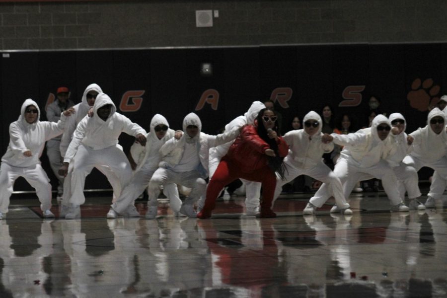 Nadine Dockendorf (shown in red) as Rihanna leading her “backup dancers” 
