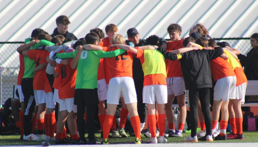 Central Kitsap High School´s very own JV boys soccer in a team huddle before a match against Peninsula. 