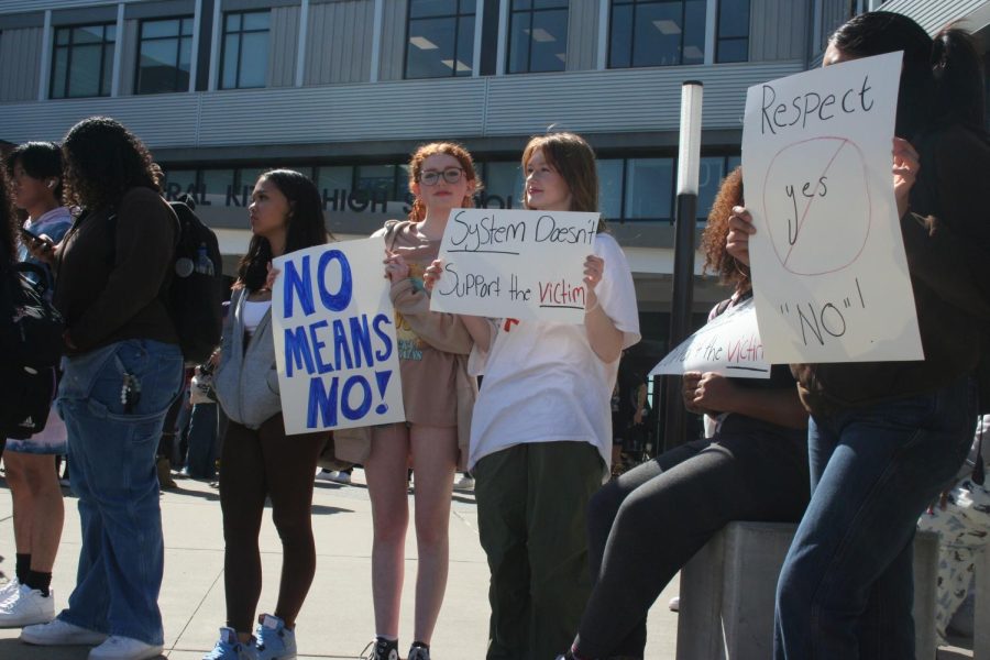 Students hold up their signs protesting at SAAM (Sexual Assault Awareness Month) walkout at CKHS. 