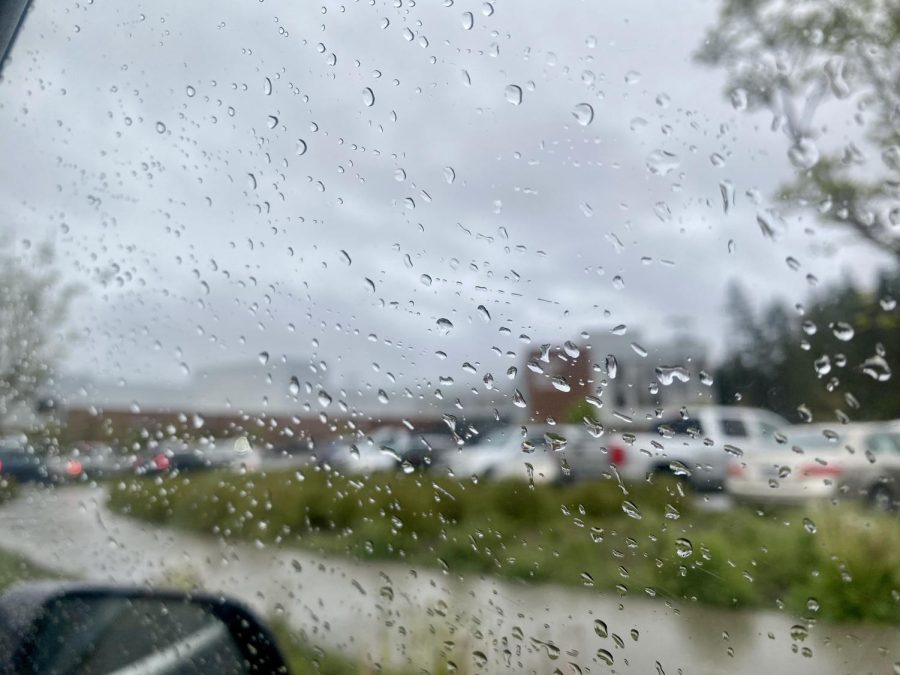Photo from car on rainy day of CKHS entrance. Student drives up to CKHS in the morning on a rainy day. Taken by Maddie Johnson.