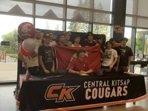 Garrett Cooper celebrates his commitment to Washington State University for Baseball  with friends at CK athletes signing day.