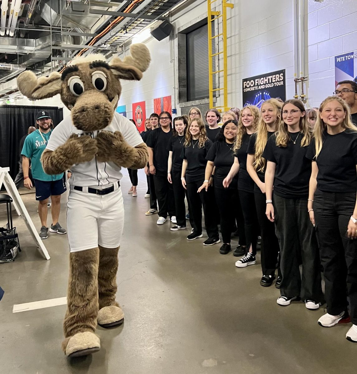 The+Mariners+Moose%2C+who+is+standing+beside+the+Central+Kitsap+Choir.