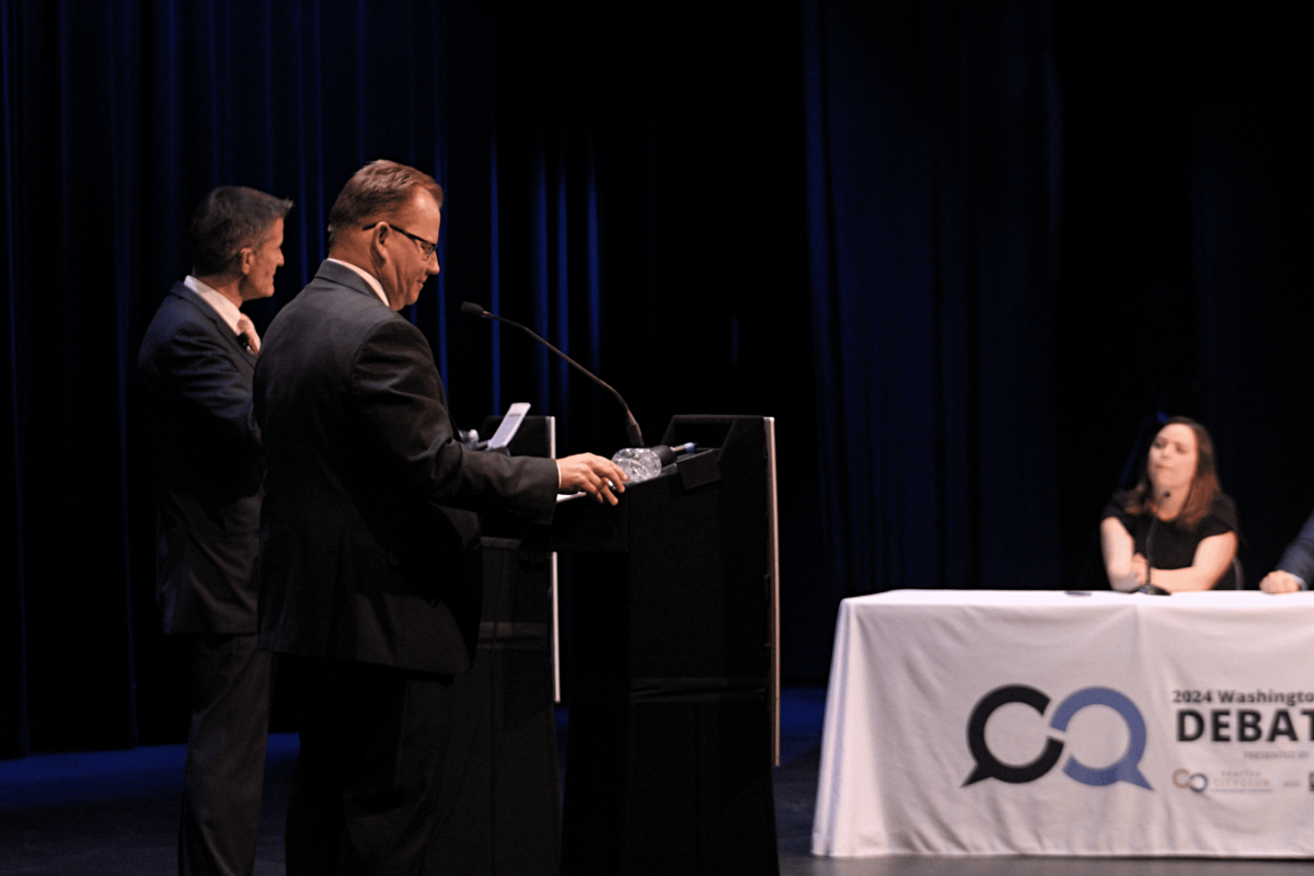 Chris Reykdal (Close) and David Olson (Far) preparing to answer questions presented by the moderators. 