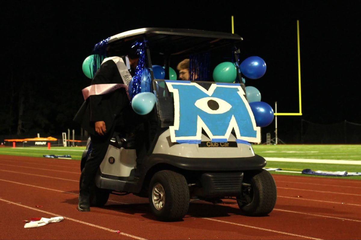 John Collins and JC Valenzuela's Monsters Inc. themed golf cart.