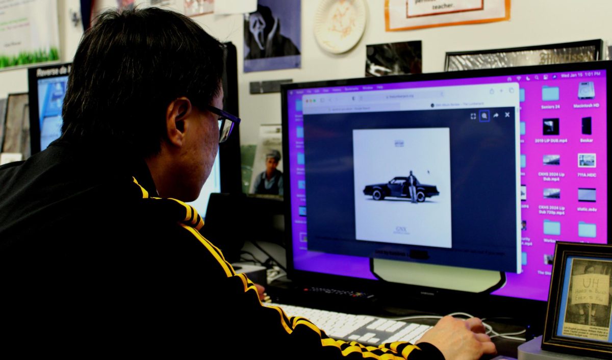 David Tracewell, a media collector at CKHS, admires Kendrick Lamar's black Grand National used to inspire the title of the album. 