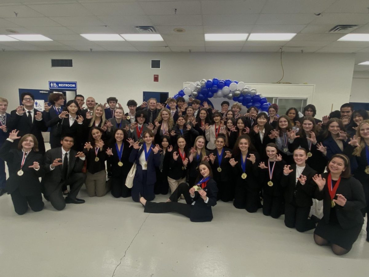 Central Kitsap High School DECA members pose for a photo at the area competitions. (Brian Oathout)