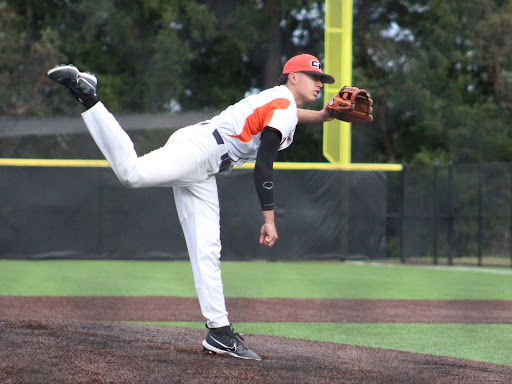 Grant Lin pitches the baseball during the game against Fife high school.