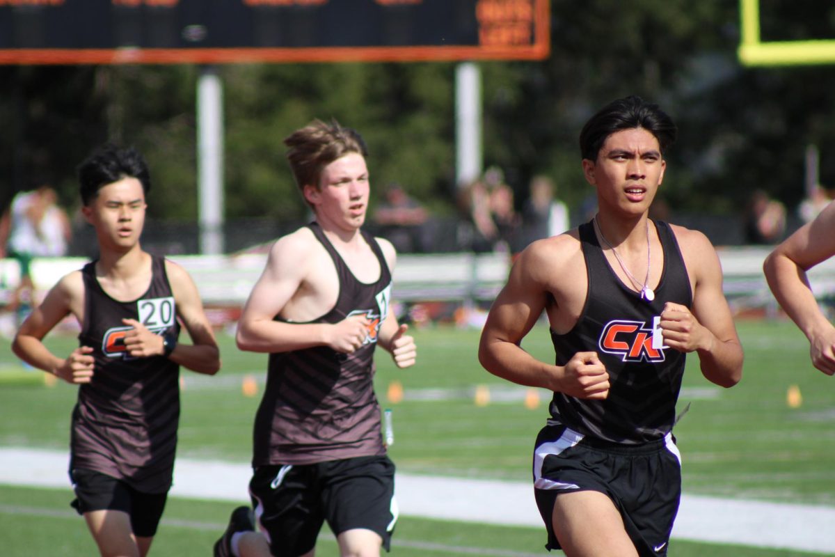 Central Kitsap boys track team competing (left to right, Daniel Escano, Joshua Dennison, JC Valenzuela)