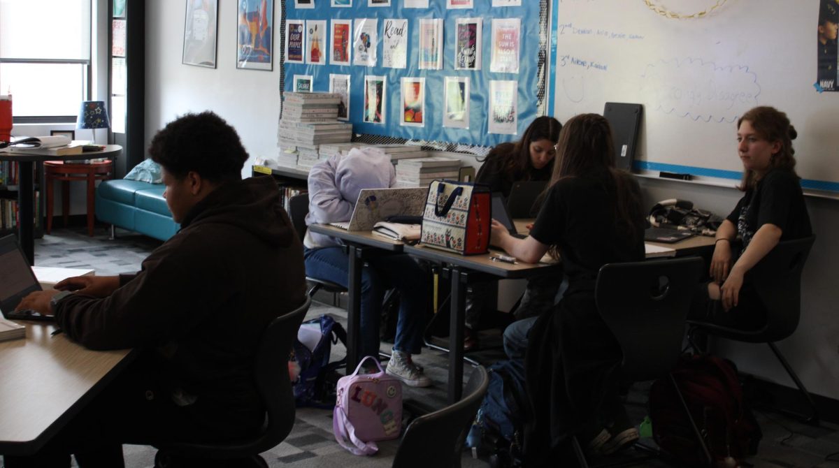 Students sit in Jessica Hanthorn's darkened classroom.