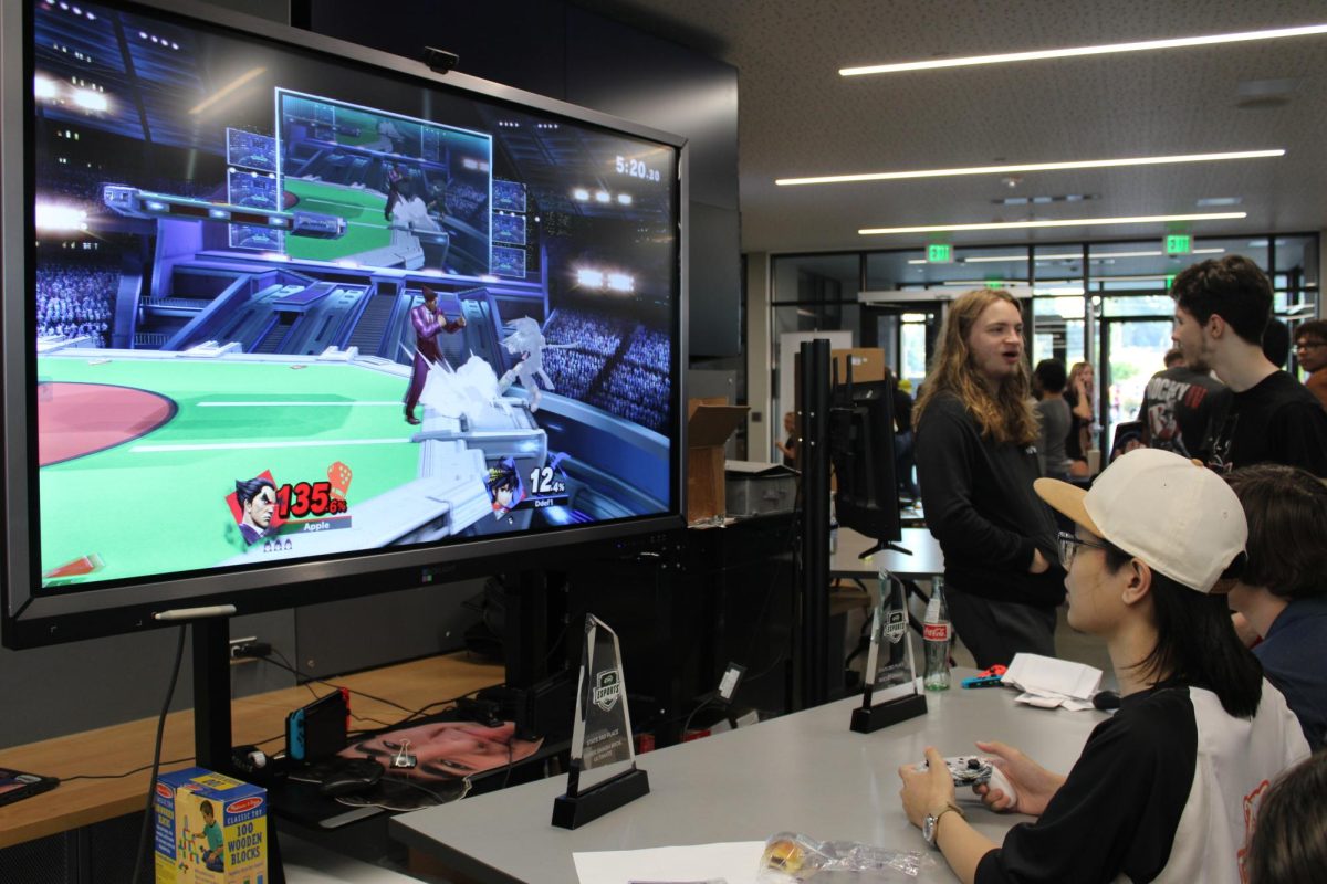 Members of the Esports club play a match of Super Smash Bros Ultimate during Maze Day.