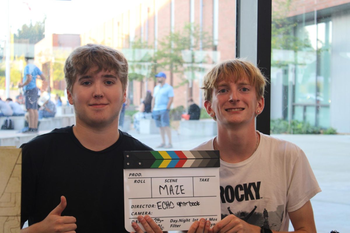 Jerakye Hasty (left) and Ethan Huff (right) pose for a photo during Maze Day.
