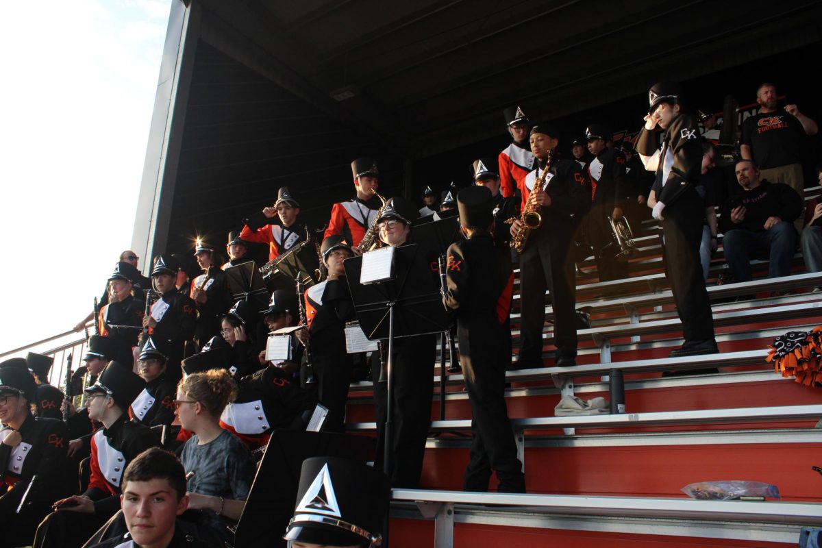 The CKHS pep band sets up and prepares to play.