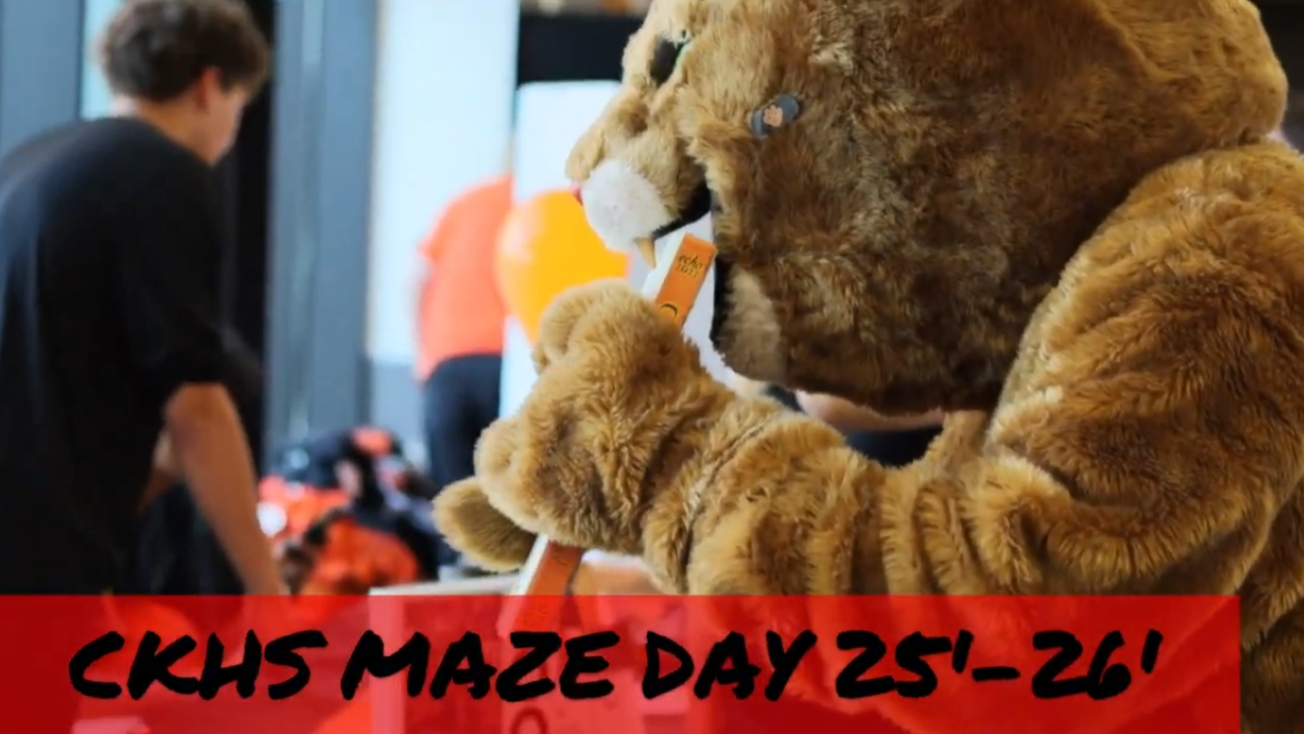 CKHS mascot visiting the yearbook table on Maze Day. 