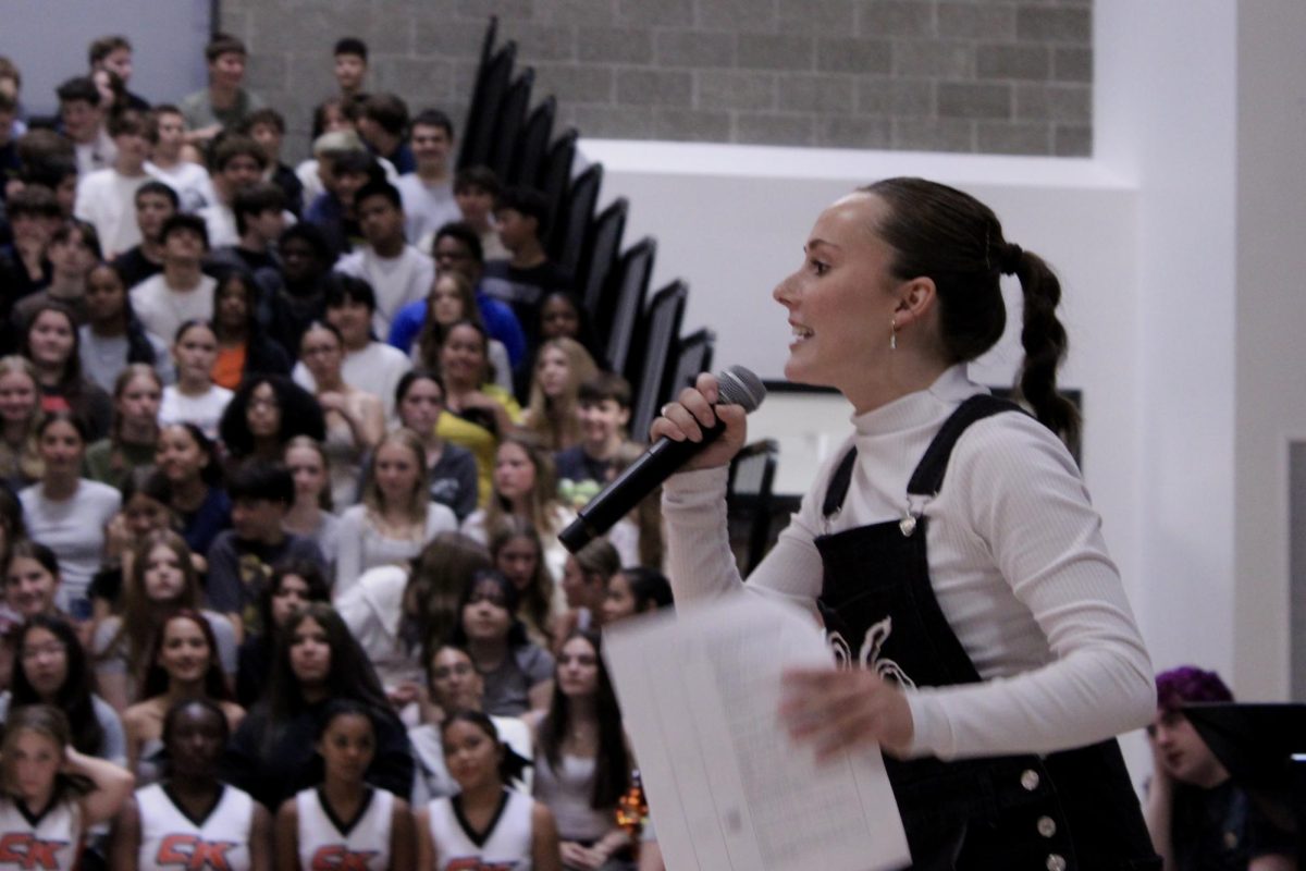 Emily West enlivens crowd.