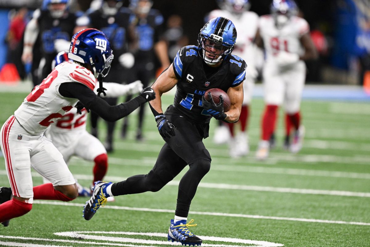 Detroit Lions wide receiver Amon-Ra St. Brown (14) runs with the ball in the third quarter against the New York Giants at Ford Field. Lon Horwedel Reuters Images