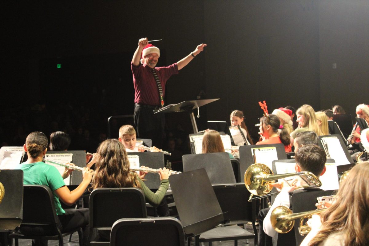 CKMS Band one getting their instruments in position.