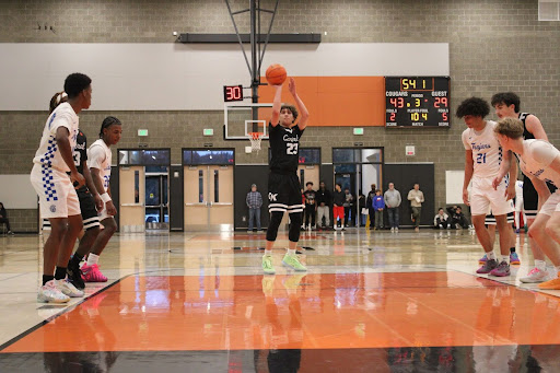 Senior Liam Bieber takes a free throw shot.
