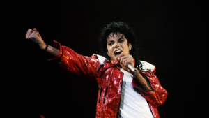 Michael Jackson shakes his fist at the crowd during a performance. Provided by Getty Images.
