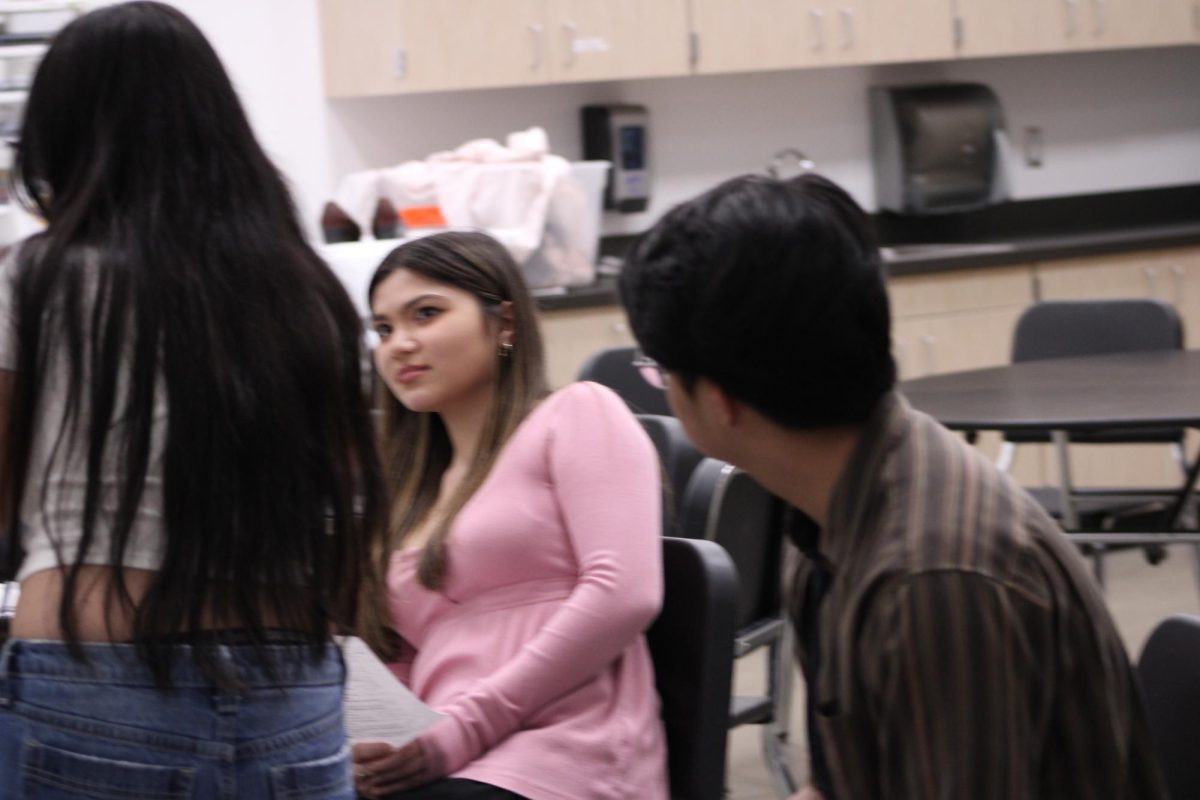 Hannah Escamilla acting weirded out while Juancho Perez stares at her in this scene 