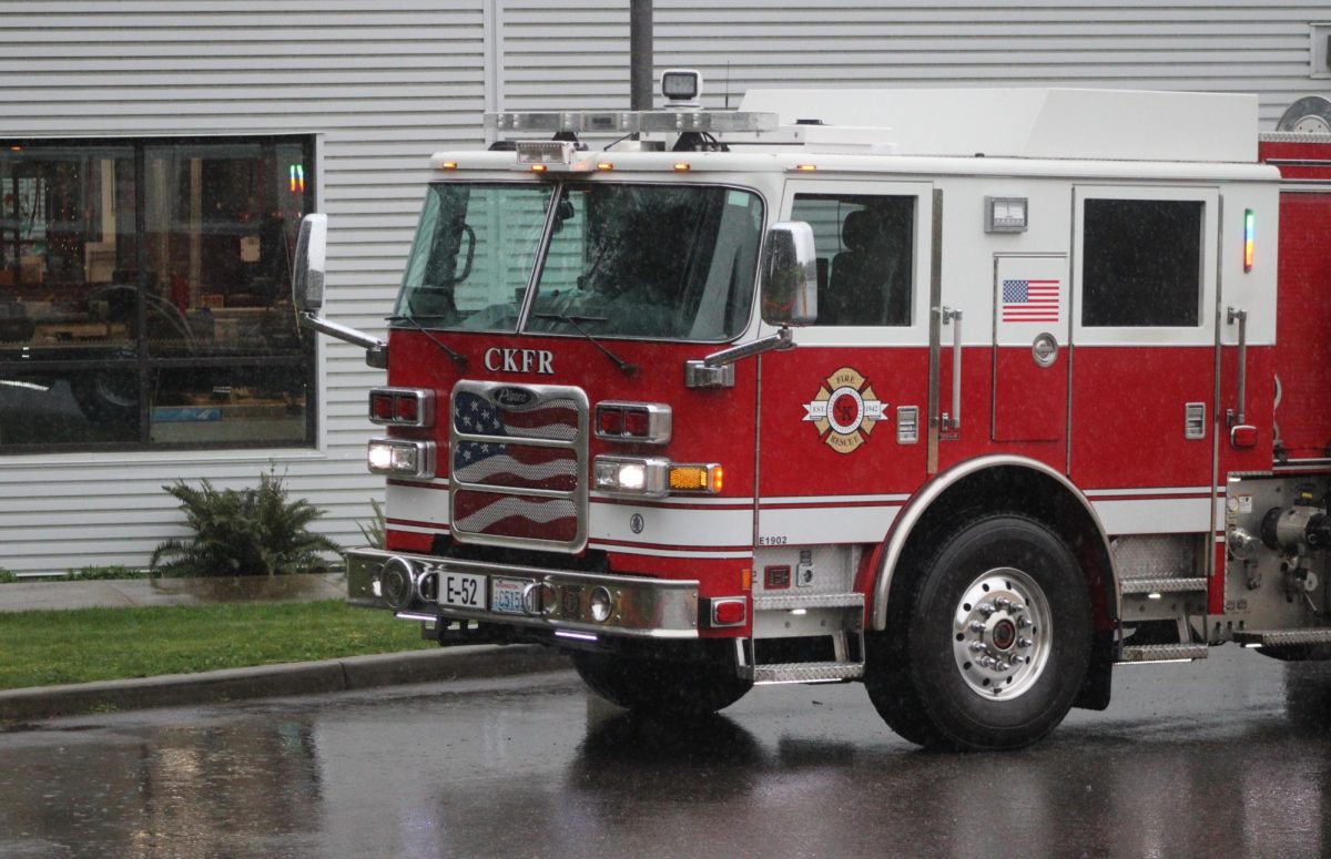 A firetruck parks near the CTE building during a fire evacuation.