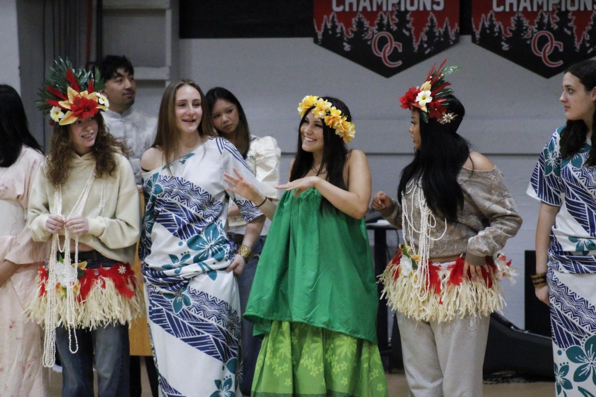 During the opening ceremony, students line up in the gym to show the different cultures that make up the community. 