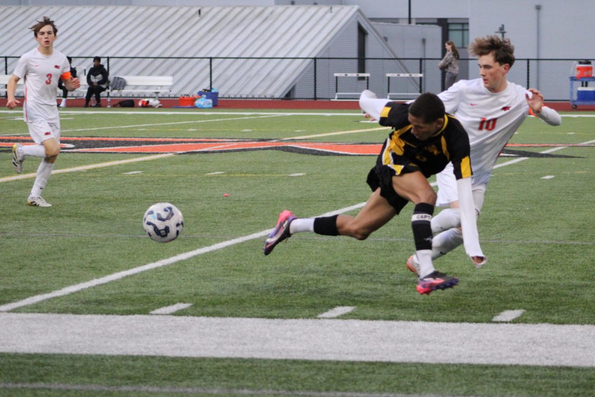 Junior Kamden Bailey fights for control of the ball.