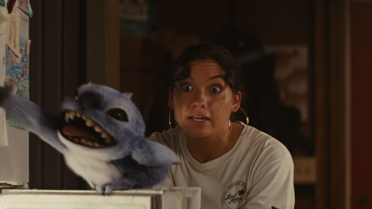 Stich (Chris Sanders) escaping from Nani (Sydney Agudong) in 2025's live action 'Lilo and Stitch' Provided by Disney